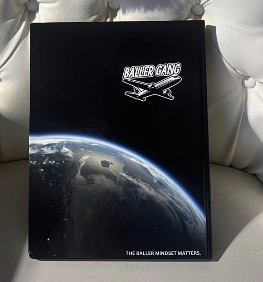 Back cover of The Baller Mindset Matters featuring the Baller Gang airplane logo and Earth